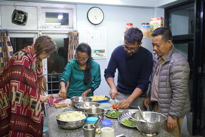 Cook and Dine with a Local family - Cooking dal bhat in a family kitchen