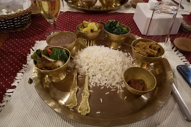 Dinner with Cultural Show Kathmandu - Copper plates, momos, curries, and yogurt dessert