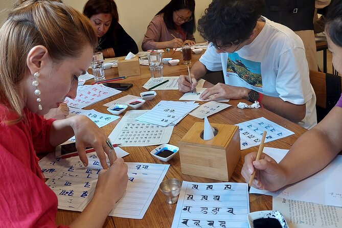 Discover Ranjana Lipi the Traditional Newari Script - Eating Samay Baji between writing exercises