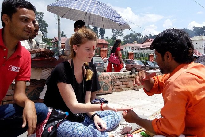 Kathmandu Spiritual Sites: Bodhnath & Pashupatinath Tour - The Pashupatinath aarti after dark