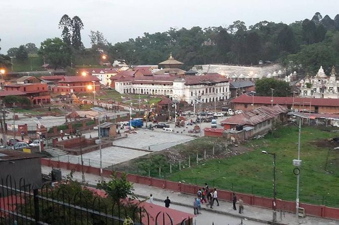 Private Half-Day Tour of Boudhanath and Pashupatinath Temples in Kathmandu - Boudhanath Stupa and the circle of prayer wheels